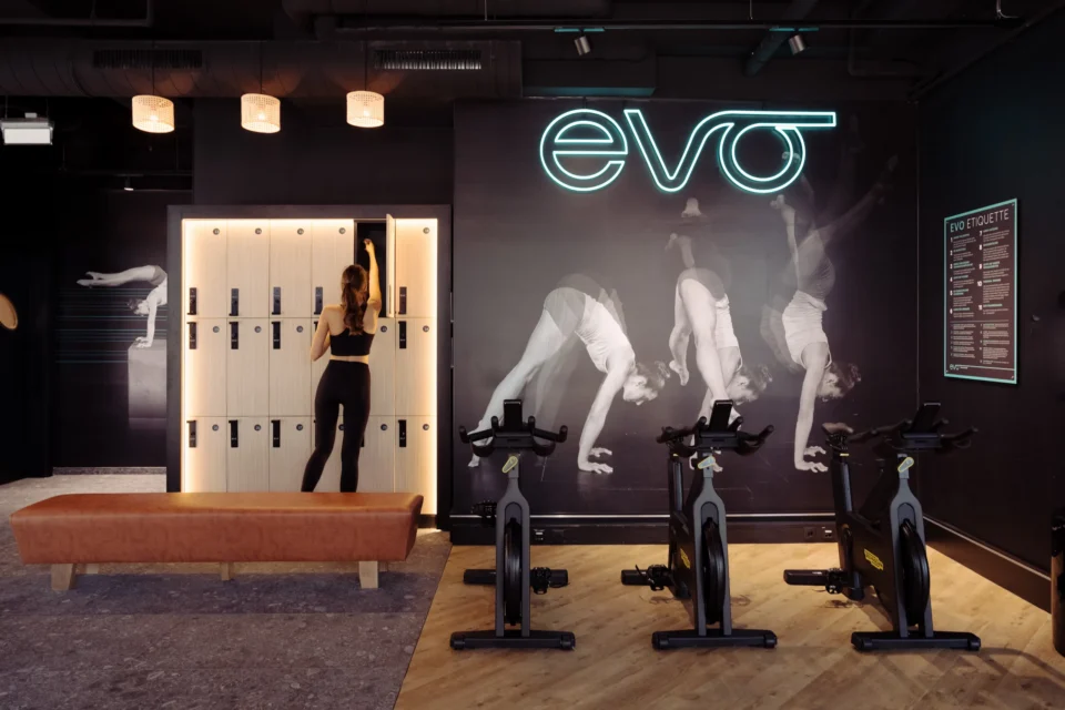 Locker area and stationary bikes at EVO Fitness